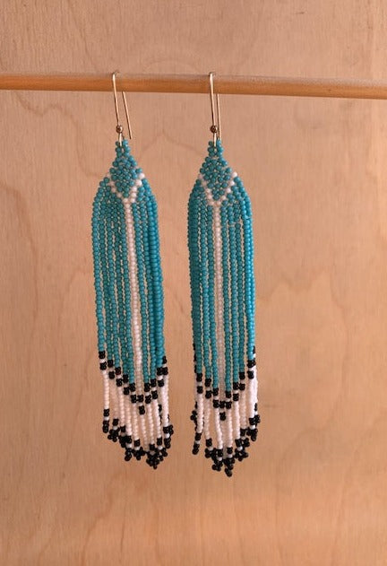 feather in blue