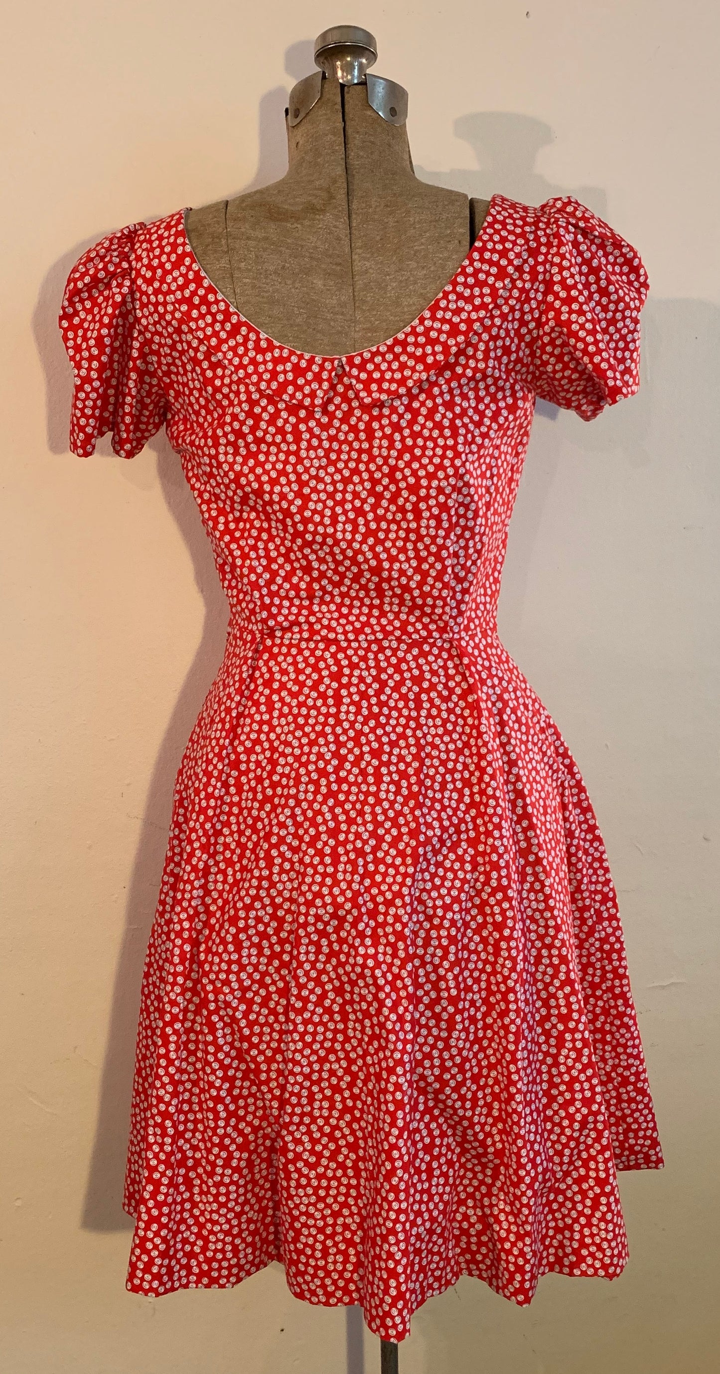 red and white poke-a-dot dress