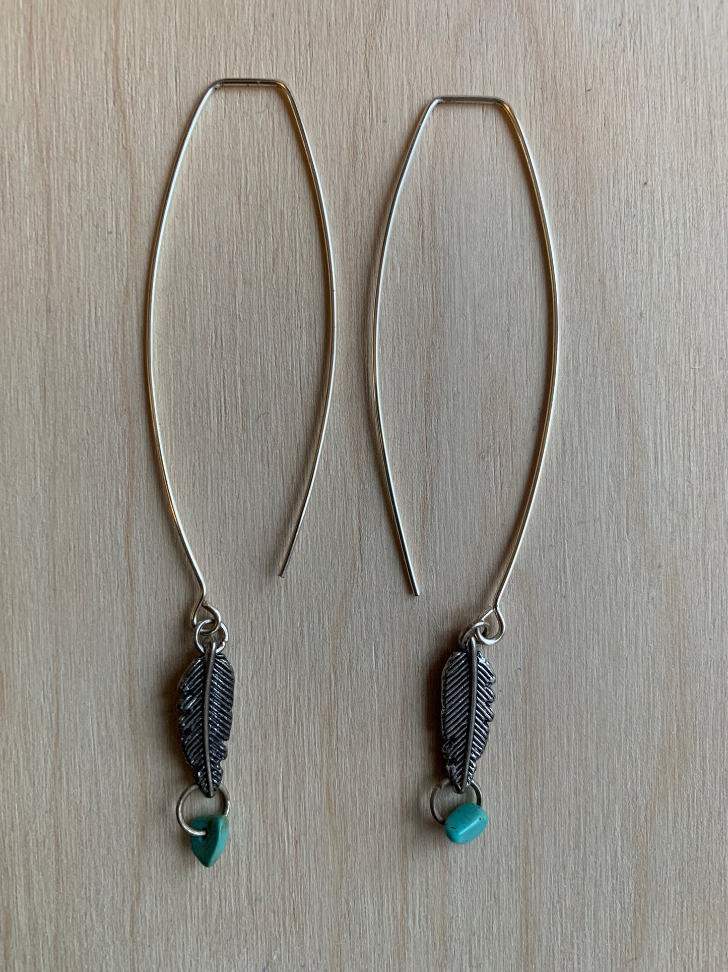 feather with turquoise